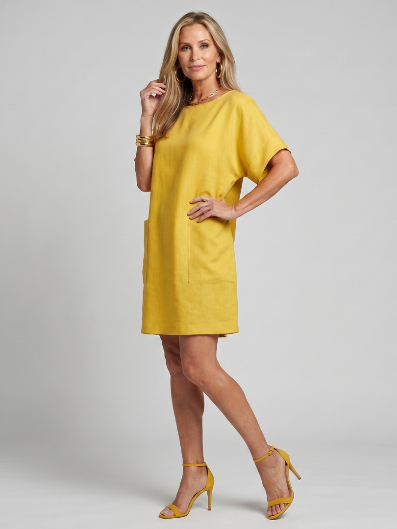 Calliope | Kurzärmeliges Kleid mit aufgesetzten Taschen in Kniehöhe