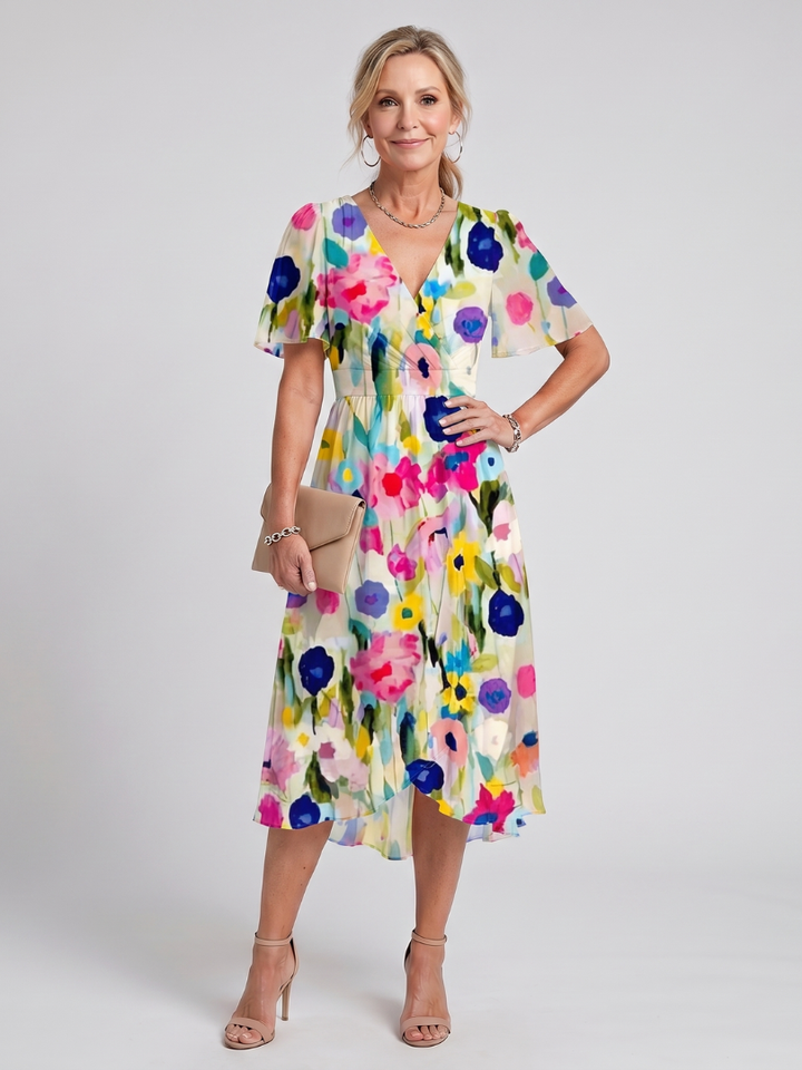 Mirabel | Kleid mit schwingenden Ärmeln und geraffter Taille im Blumenmuster